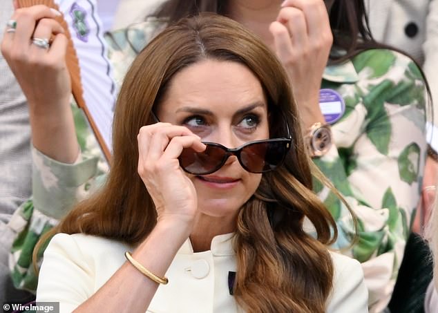 The Princess of Wales takes a sneak peak behind her chic sunglasses at the Wimbledon Women's final