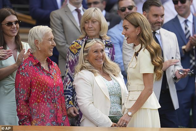 Princess of Wales smiles as she greets tennis legend Martina Navratilova in the Royal Box on Centre Court ahead of the women's singles final