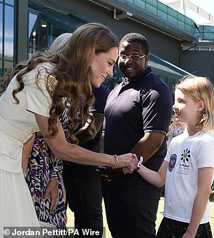 Kate met Lydia Lowe, eight, from the Dan Maskell Tennis Trust, before watching the final on Saturday