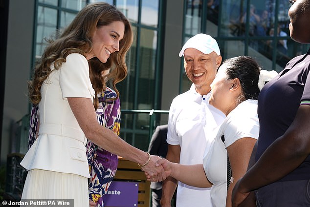Kate, who styled her long, brunette locks in curls for the occasion, appeared cheerful as she met Ziying Wang, Ladies Singles Wheelchair Final Champion with Ralph Yin, coach and translator