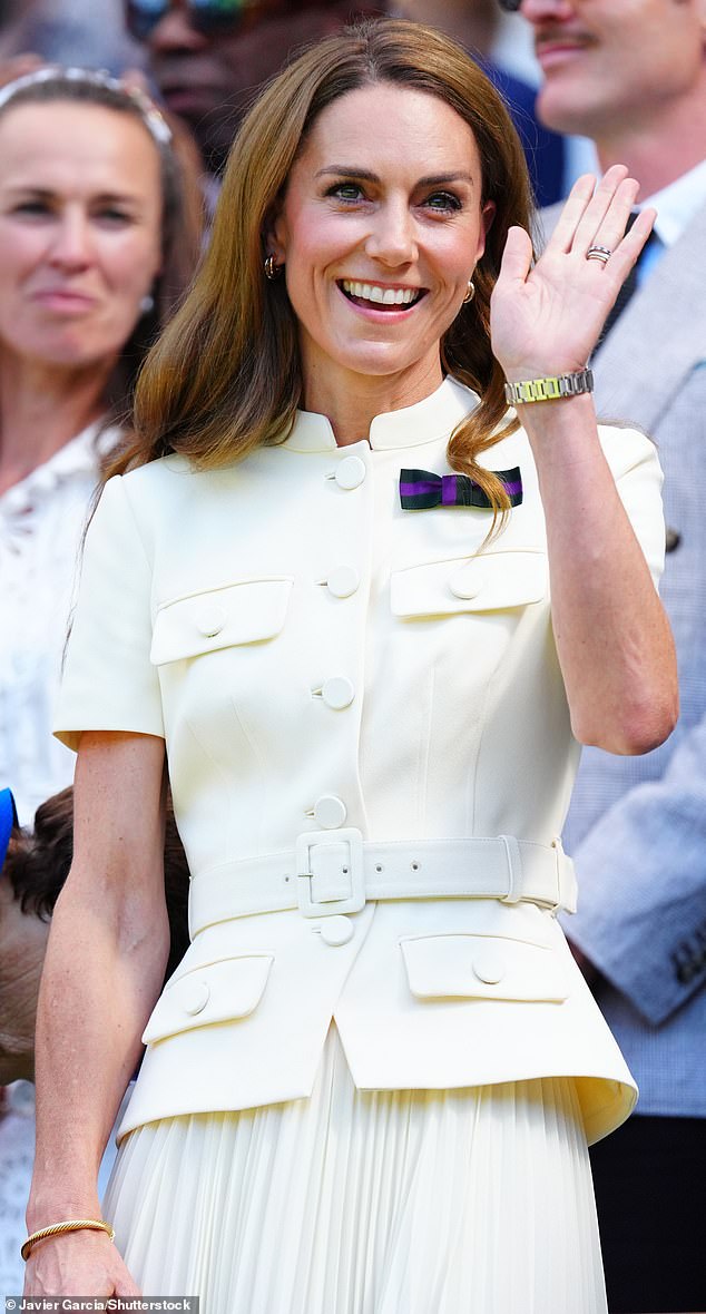 As usual, Kate also donned a special accessory - her Wimbledon bow brooch, featuring the organisation's official colours of green and purple