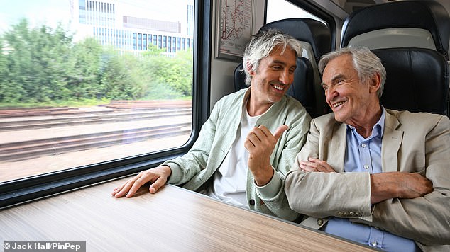 Larry has teamed up with his son former TV presenter George Lamb on a new campaign with National Rail which involved the duo going on a train ride together