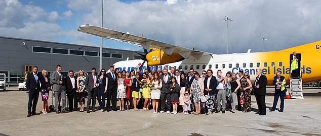 The ceremony (pictured) unfolded on a plane circling Bristol, in tribute to their long-haul flight to the other side of the world