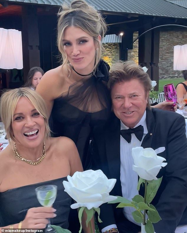 Mia (left), who is currently dating Nine star Richard Wilkins (right), has been behind some of Delta Goodrem's (centre) biggest looks over the years