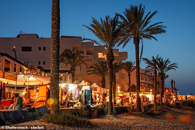 And dining out on the island is reasonable, with a beer costing around £3 a pint, compared to £6 to £11 in the Maldives (Pictured: The tourist resort of Es Pujols in Formentera)