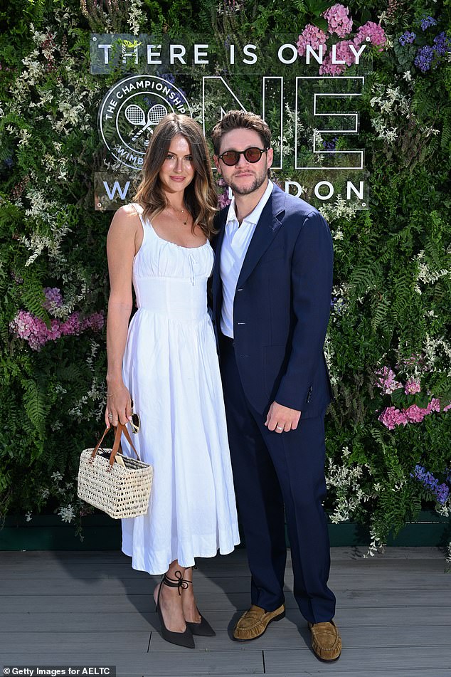Also putting on a loved-up display at the tournament were Niall Horan and his girlfriend, Amelia Woolley