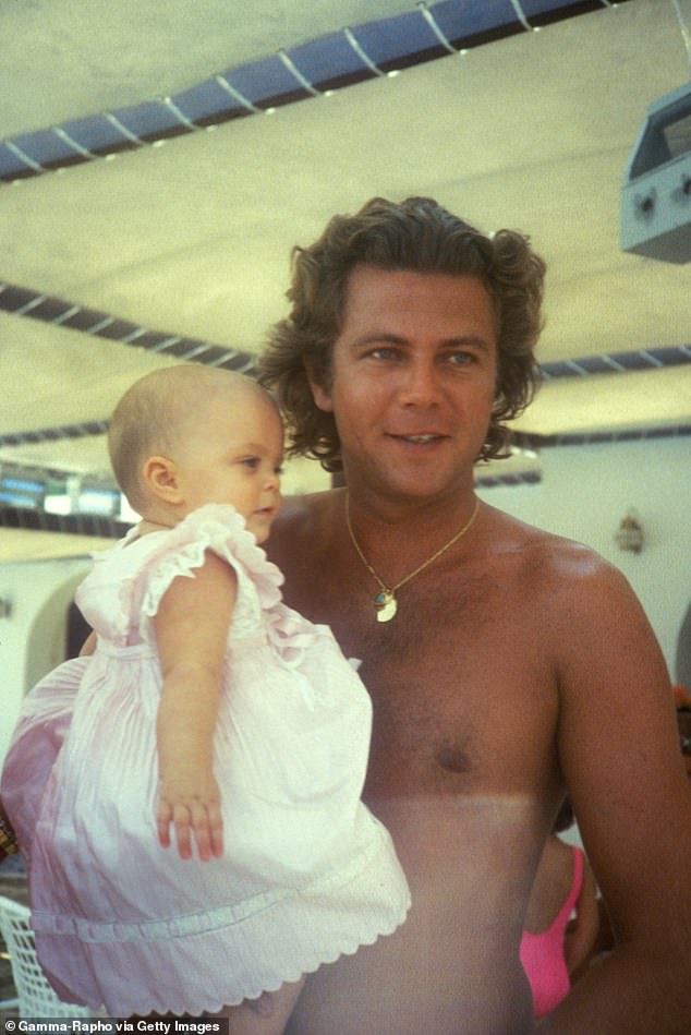 Athina is believed to have no contact with her father and has even dropped his last name (pictured together)