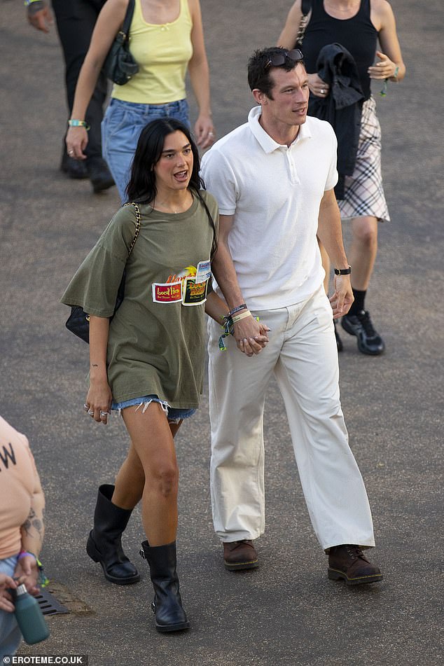 Callum opted for an all-white attire, wearing a white polo and chino trousers, while pairing them with a brown boot