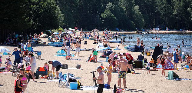 AVIEMORE: Crowds descended on Loch Morlich beach as the Scottish Highlands reached 32C on July 12, 2025