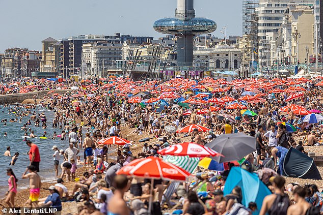 SUSSEX: Sunseekers packed Brighton Beach as the third UK heatwave of the year scorched Britain on July 12, 2025