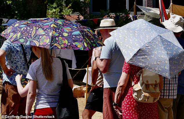 BERKSHIRE: Umbrellas were deployed at the Bastille Day Festival in The Forbury Gardens on July 12, 2025