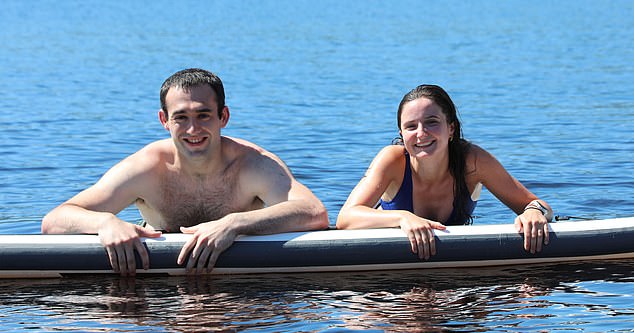 SCOTLAND: Lewis MacKay and Leia Paul from Muir of Ord take a cooling dip in Loch Ness on July 12, 2025