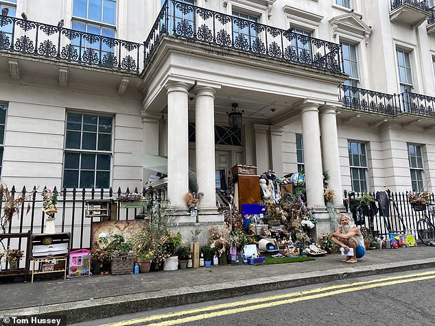 He has amassed a lucrative collection of items at his makeshift shelter on the steps of Britain's most expensive home