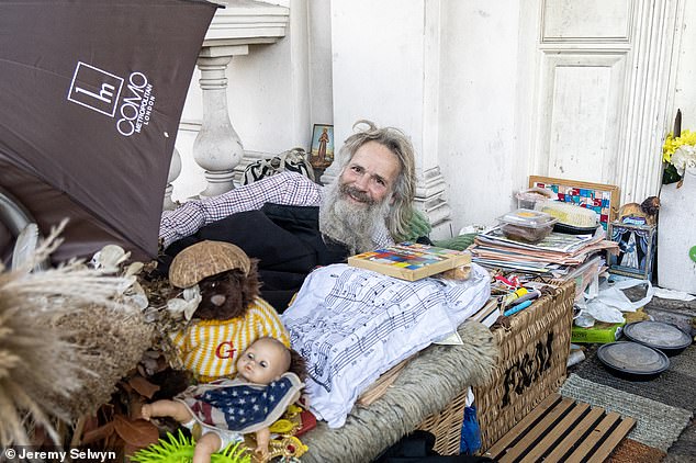 He sleeps next to many of the items which have been donated, including food from a Fortnum and Mason hamper - valued at £5,000