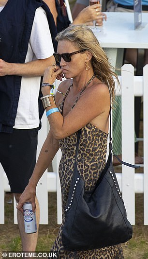 The image of Kate with a beer and vape in hand is in stark contrast to the clean-living persona she's had in recent years following her heyday in which she was nicknamed 'The Tank' by friends for her love of substances