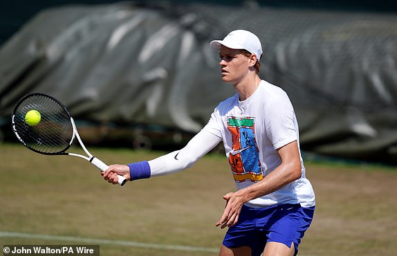 Jannik Sinner during a practice on day fourteen of the 2025 Wimbledon Championships at the All England Lawn Tennis and Croquet Club, London. Picture date: Sunday July 13, 2025. PA Photo. Photo credit should read: John Walton/PA Wire.RESTRICTIONS: Editorial use only. No commercial use without prior written consent of the AELTC. Still image use only - no moving images to emulate broadcast. No superimposing or removal of sponsor/ad logos.