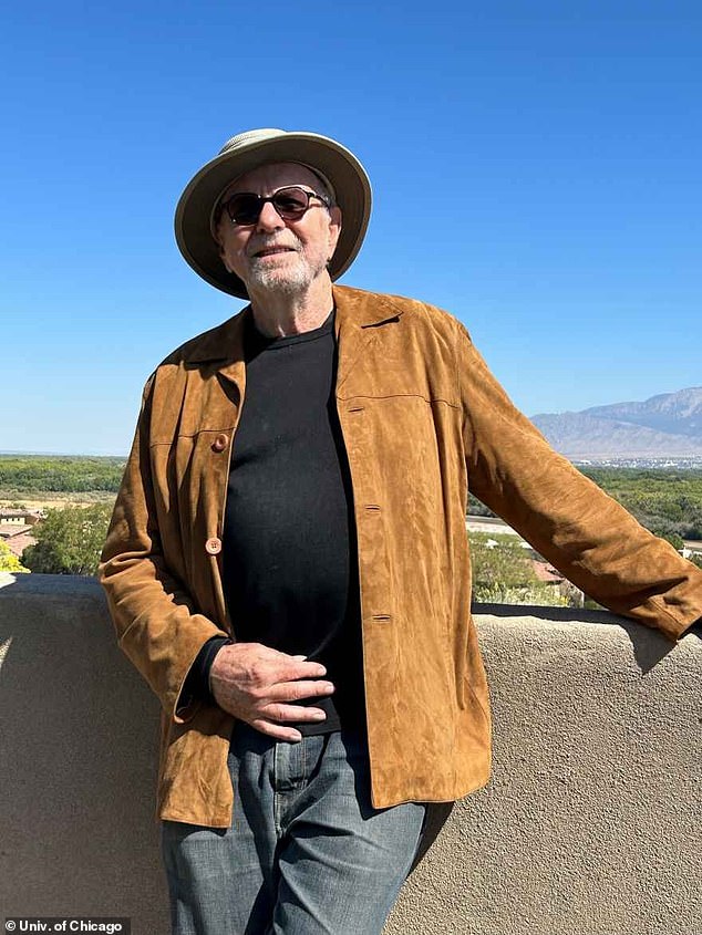 W.J.T. Mitchell (pictured), a leading image theorist and professor at the University of Chicago, spoke to the Daily Mail about the iconic image from Trump's assassination attempt