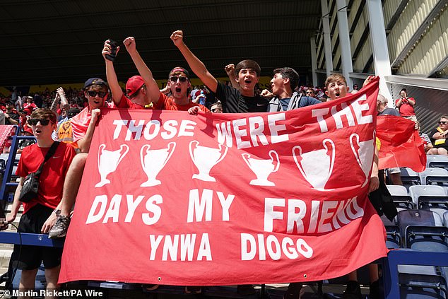 Supporters were pictured in the stands with a flag including the message 'YNWA Diogo'