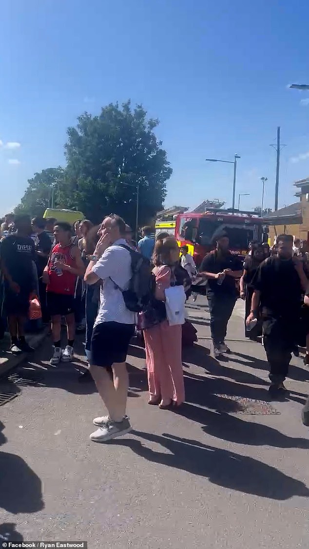 A firetruck and an ambulance are also seen at the nearby railway station