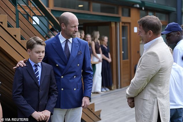 The Prince of Wales looked sharp in a navy jacket and white trousers as he put his arm around Prince George