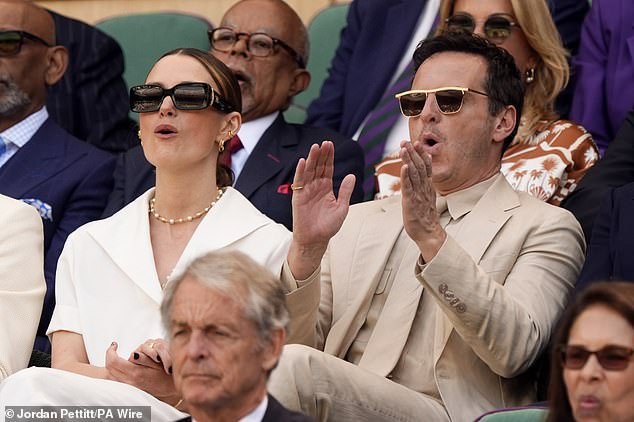 British actress Keira Knightley (pictured with Irish actor Andrew Scott) donned Wimbledon Whites as she caught the action on court