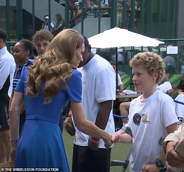 The mother-of-three shook Ambrose's hand before taking her seat in the Royal Box on Sunday afternoon