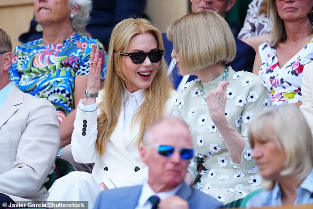 Anna wore a white figure-hugging dress that featured long sleeves, oozing summer with petals stitched on to the frock