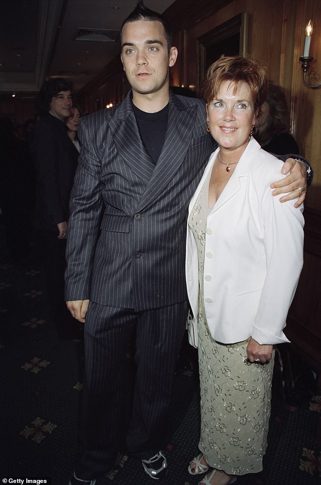 Towards the end of last year, Robbie told The Mirror that he 'didn't know' how to cope with the 'incredibly complicated' situation (pictured with his mum in 1998)