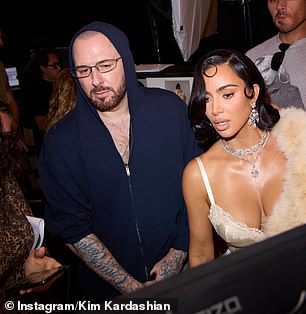 he jewelry she wore also included a multi-carat diamond necklace