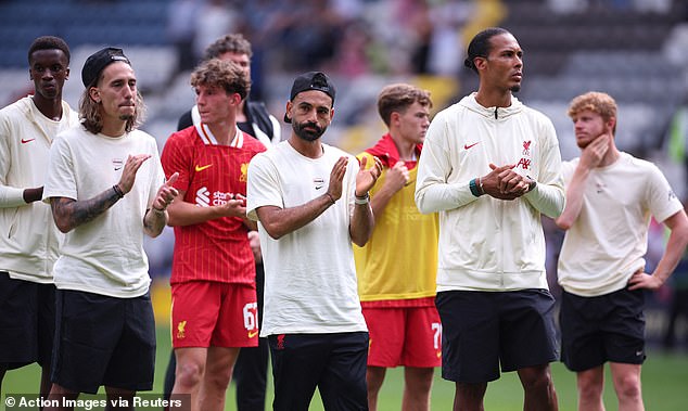 The Liverpool players stood on the pitch at Deepdale and listened as the fans sung Jota's chant