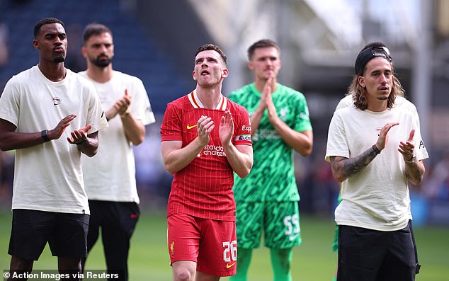 Liverpool players including Ryan Gravenberch, Andrew Robertson and Kostas Tsimikas applaud the fans