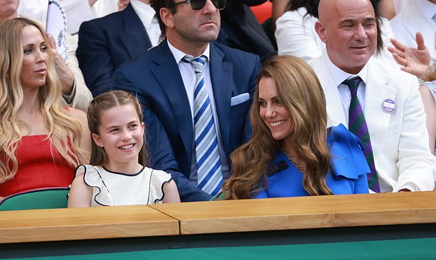 Mother and daughter smile as they enjoy the game, with Princes Catherine watching her daughter in adoration