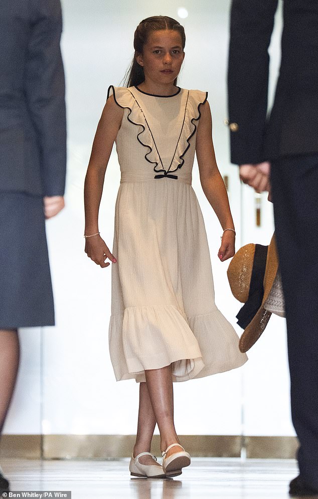 Princess Charlotte makes her way to the Royal Box on day fourteen of the 2025 Wimbledon Championships at the All England Lawn Tennis and Croquet Club
