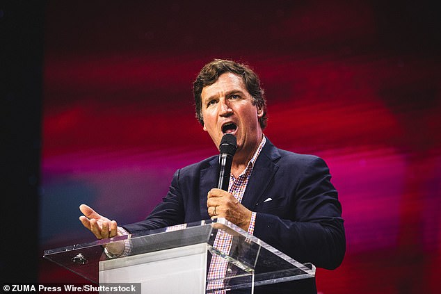 Tucker Carlson speaks to a group of 5,000 MAGA supporters at Turning Point USA's 'Student Action Summit' in Tampa, Florida, on July 11th 2025