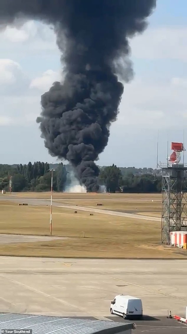 A huge plume of black smoke was seen coming off the runway