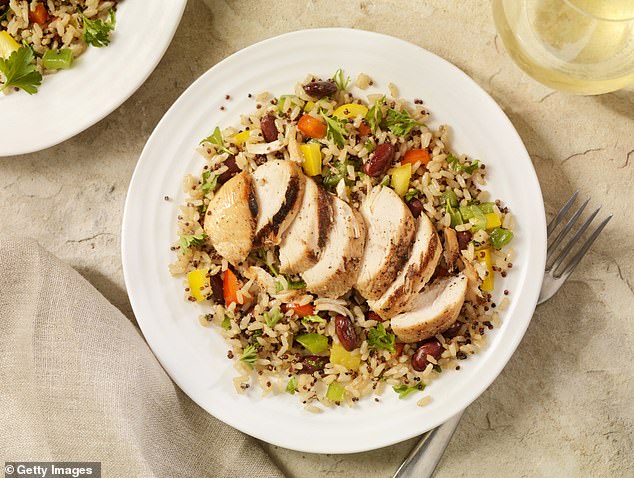 Garlic and ginger, sesame oil, and edamame make the chicken fried quinoa a great option for keeping stress levels in check and preventing a blood sugar spike (stock)