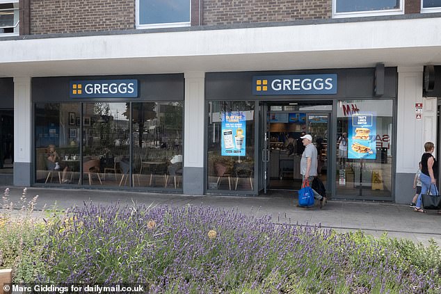 Shoppers walk past one of the three Greggs in the city centre