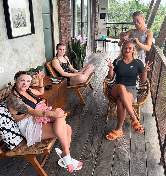 Pictured: Hettie with her fellow travellers at a wellness retreat in Bali