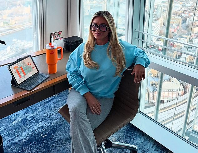 Hettie created Hettie's Holidays and Hospitality in June 2022 based on her passion for solo travelling. She's pictured at The Shard, London
