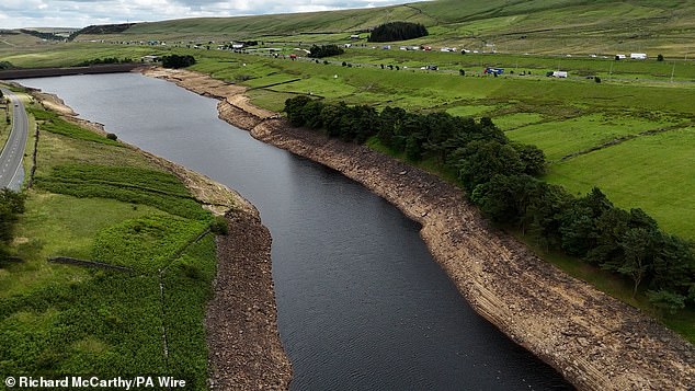 Hosepipe bans were implemented this week for around six million householders across Yorkshire and the South East. Pictured: Booth Wood Reservoir in West Yorkshire at low levels earlier this week