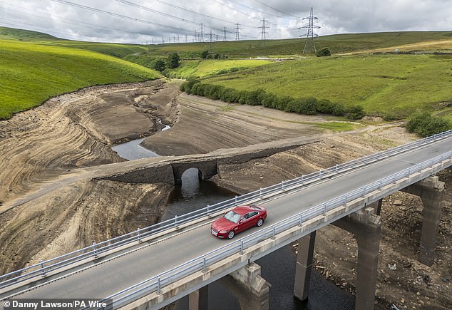 More than a million customers in Kent and Sussex have also been slapped with a hosepipe ban, announced by South East Water on Friday. Pictured: Baitings Reservoir in Ripponden, West Yorkshire
