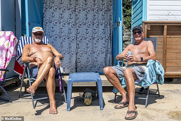 Sitting in deck chairs not far from the epicentre of a cannabis cloud, Mike Lucas, pictured right, and Bernd Rohring, left, regret that visiting their beach hut is not as relaxing as it used to be