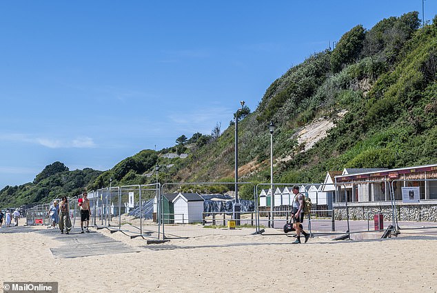 An area of the beach remains closed off some time after the landslides