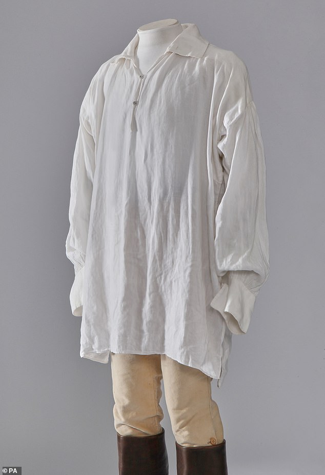 The now dry shirt was sold for a hammer price of £20,000, with the buyer's premium of £5,000 taking the overall total to £25,000