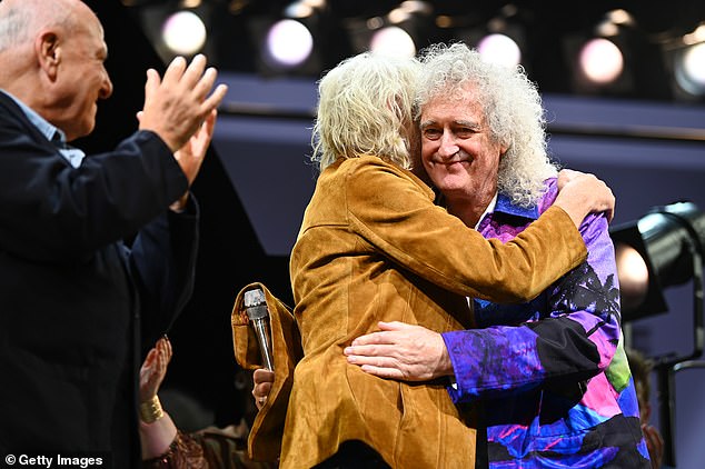 Queen legend Brian May, 77, was seen hugging Bob, 73, as the pair appeared to get emotional