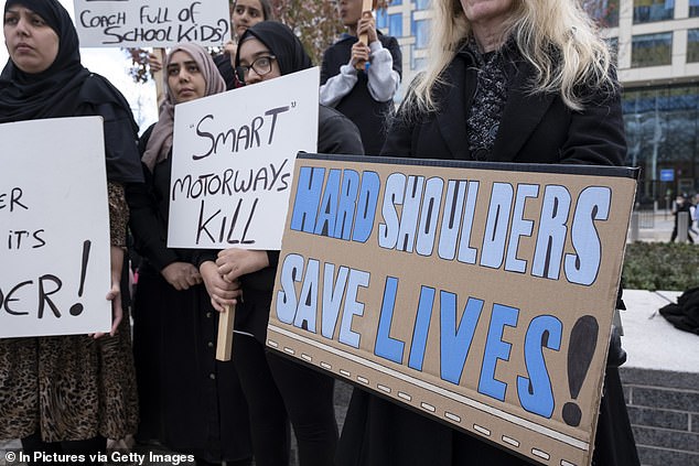 Pictured: protesters against smart motorways. Many have raised particular concern regarding the 'all-lane running' (ALR) smart motorway. This means that drivers can become marooned in live traffic if they are unable to reach an emergency layby