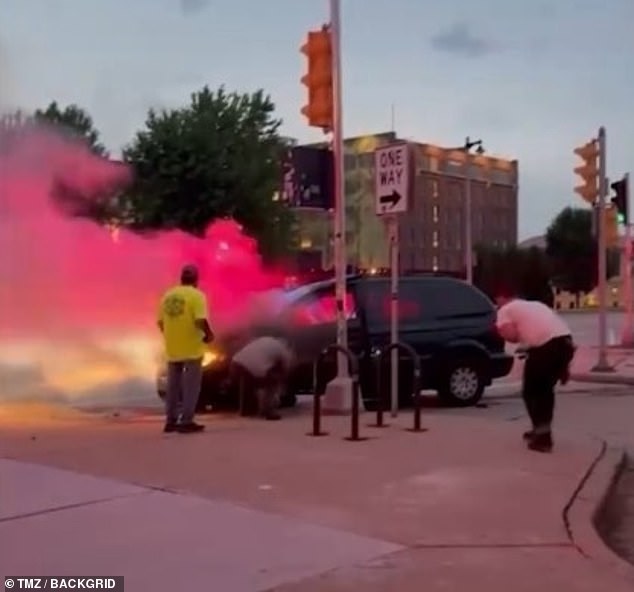 The Game of Thrones alum, known for his role as Khal Drogo in the HBO series, stood off to one side of the scene, which showed a minivan smoking as a group of bystanders worked together to prevent it from bursting into flames