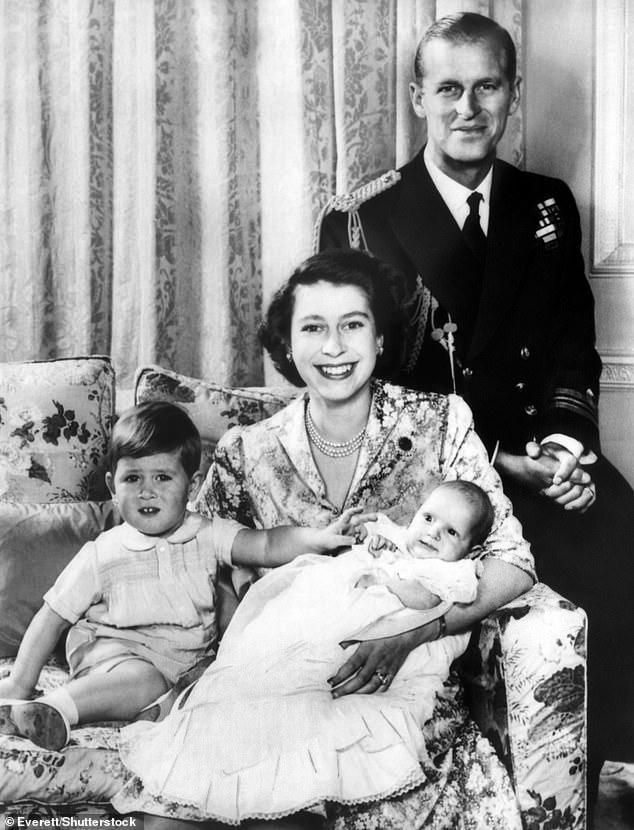Prince Philip and Queen Elizabeth II with a young Charles and a baby Princess Anne in 1951