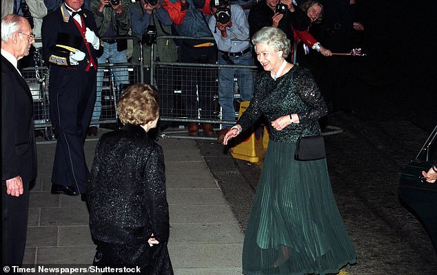 Thatcher curtsy for the Queen at her 70th birthday party. Brandreth highlights that the Queen showed the first female PM 'considerable respect' during her long period in office including attending two of her birthday parties