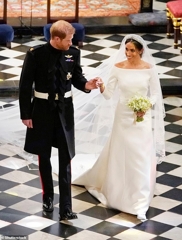 Harry and Meghan in St George's Chapel, Windsor, on their wedding day. Thomas also suffered suffered two heart attacks just before the ceremony, preventing him from walking his daughter down the aisle